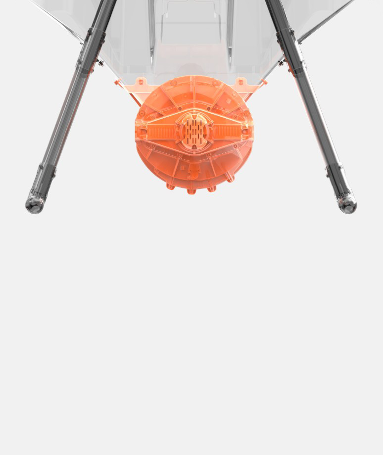 A close-up view of the underside of a device with two black support legs and an orange circular component against a white background.